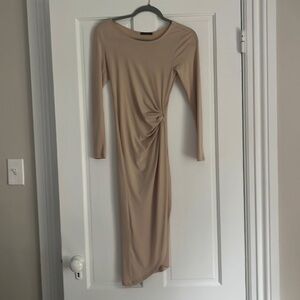 Donna Milano nude long sleeved dress size small.